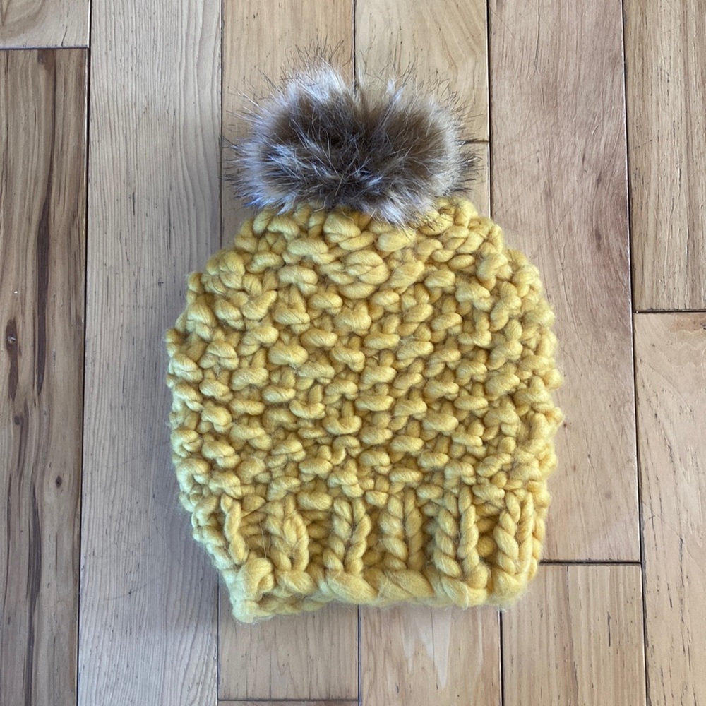 Knit yellow puff hat